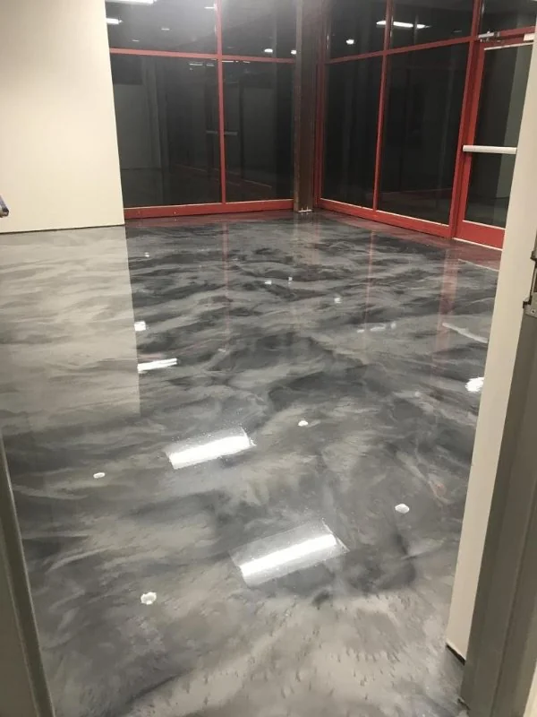 Epoxy floor coating in a Northwest Arkansas commercial space — USA Concrete Co.