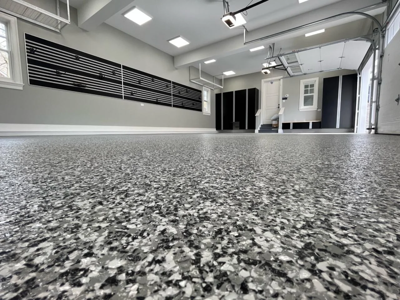 Epoxy flake garage floor coating installation in Van Buren by USA Concrete Co.